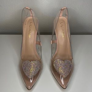 Clear pumps with bedazzled heart